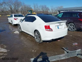 2012 Scion tC with VIN JTKJF5C70C3031365, listed as a IAAI auction lot 41607290 with 241,183 mi miles. Bid and sale history available at carsss.com. Image 3.