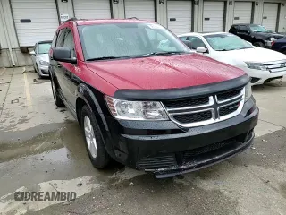 2013 Dodge Journey SE with VIN 3C4PDCAB3DT723547, listed as a Copart auction lot 48140495 with 159,979 mi miles and Salvage title. Bid and sale history available at DreamBid. Image 12.