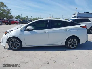 2022 Toyota Prius L Eco with VIN JTDKAMFU1N3177444, listed as a IAAI auction lot 41812402 with 44,666 mi miles. Bid and sale history available at carsss.com. Image 14.