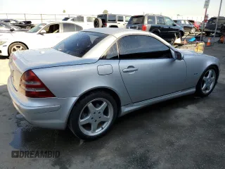 2002 Mercedes-Benz SLK-Class 2.3L Kompressor with VIN WDBKK49FX2F268683, listed as a Copart auction lot 68705174 with 132,677 mi miles and Salvage Title. Bid and sale history available at carsss.com. Image 3.