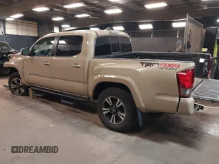 2016 Toyota Tacoma SR with VIN 5TFCZ5AN4GX033255, listed as a IAAI auction lot 41920633 with 71,681 mi miles and . Bid and sale history available at carsss.com. Image 3.