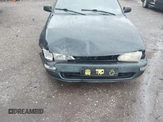 1997 Toyota Corolla with VIN 2T1BA02E2VC211034, listed as a IAAI auction lot 42253359 with 201,451 mi miles and . Bid and sale history available at DreamBid. Image 6.