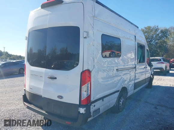 2022 Ford Transit Cargo with VIN 1FTBW3U85NKA01097, listed as a IAAI auction lot 41076643 with 24,786 mi miles and . Bid and sale history available at DreamBid. Image 4.