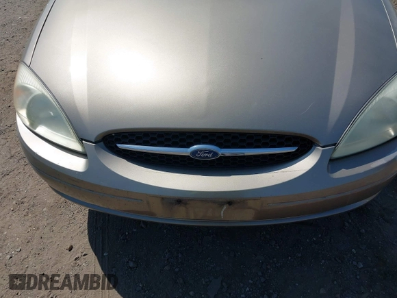 2003 Ford Taurus SE Standard with VIN 1FAHP58S13A147675, listed as a IAAI auction lot 42079930 with 87,523 mi miles and . Bid and sale history available at DreamBid. Image 10.