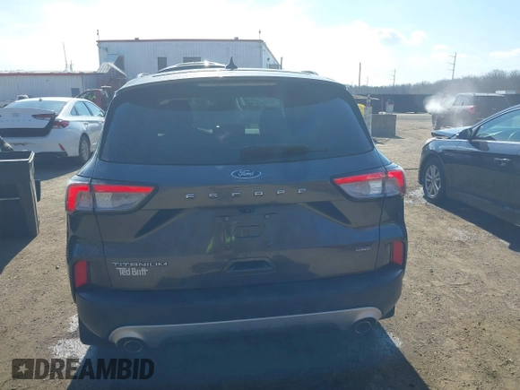 2020 Ford Escape Titanium Hybrid z VIN 1FMCU0DZ7LUB57978, wystawiony jako IAAI lot #41570242 z przebiegiem 32 819 mil mil oraz . Historia ofert i sprzedaży dostępna na DreamBid. Obrazek 17.