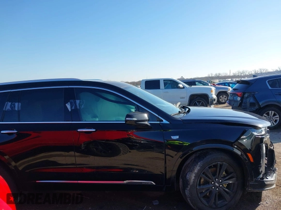 2022 Cadillac XT6 Premium Luxury with VIN 1GYKPCRS1NZ121711, listed as a IAAI auction lot 41149624 with 62,887 mi miles and . Bid and sale history available at DreamBid. Image 13.