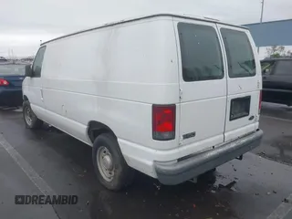 2004 Ford Econoline Cargo with VIN 1FTRE14W44HA43969, listed as a IAAI auction lot 41488289 with 268,097 mi miles. Bid and sale history available at carsss.com. Image 3.