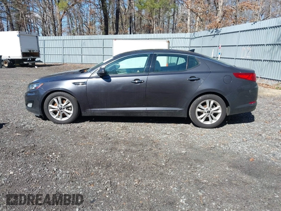 2011 Kia Optima EX with VIN KNAGN4A61B5131919, listed as a IAAI auction lot 41740091 with 102,065 mi miles and . Bid and sale history available at carsss.com. Image 14.