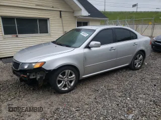 2009 Kia Optima SX z VIN KNAGE224695333733, wystawiony jako Copart lot #58548915 z przebiegiem 84 461 mil mil oraz Czysty tytuł • Clean title. Historia ofert i sprzedaży dostępna na DreamBid. Obrazek 1.
