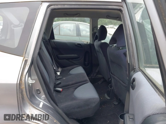 2007 Honda Fit with VIN JHMGD374X7S004101, listed as a IAAI auction lot 42477597 with 185,802 mi miles and . Bid and sale history available at DreamBid. Image 8.