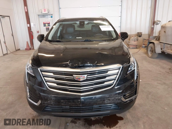 2019 Cadillac XT5 Luxury FWD z VIN 1GYKNCRS2KZ197052, wystawiony jako IAAI lot #42242466 z przebiegiem 86 678 mil mil oraz . Historia ofert i sprzedaży dostępna na DreamBid. Obrazek 12.