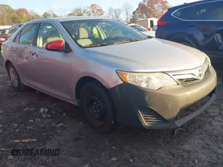 2014 Toyota Camry L with VIN 4T1BF1FK9EU392719, listed as a IAAI auction lot 41090249 with 168,064 mi miles. Bid and sale history available at carsss.com. Image 1.