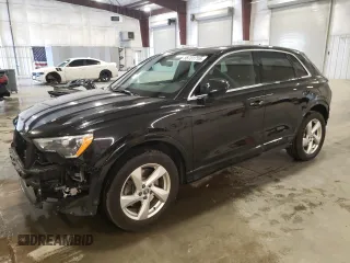 2019 Audi Q3 Premium z VIN WA1AECF38K1076064, wystawiony jako Copart lot #56731715 z przebiegiem 97 532 mil mil oraz Szkoda całkowita • Salvage title. Historia ofert i sprzedaży dostępna na DreamBid. Obrazek 1.