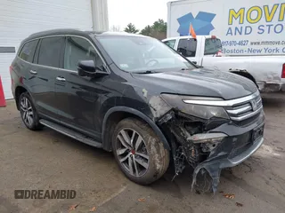 2017 Honda Pilot Touring z VIN 5FNYF6H98HB004169, wystawiony jako IAAI lot #41148529 z przebiegiem Nie podano mil oraz . Historia ofert i sprzedaży dostępna na DreamBid. Obrazek 1.