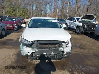 2018 Ford Fusion S with VIN 3FA6P0G77JR229730, listed as a IAAI auction lot 41426559 with 124,568 mi miles. Bid and sale history available at carsss.com. Image 12.
