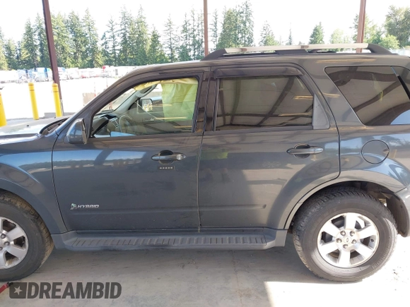 2009 Ford Escape Hybrid with VIN 1FMCU59389KB08343, listed as a IAAI auction lot 42520392 with 171,864 mi miles and . Bid and sale history available at DreamBid. Image 14.