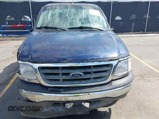 2002 Ford F-150 XL with VIN 1FTRX17L92NA56050, listed as a IAAI auction lot 41992155 with 1 mi miles. Bid and sale history available at carsss.com. Image 12.