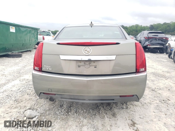 2011 Cadillac CTS with VIN 1G6DA5EYXB0137933, listed as a Copart auction lot 54679985 with 222,010 mi miles and Clean Title. Bid and sale history available at DreamBid. Image 6.