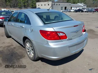 2010 Chrysler Sebring Limited with VIN 1C3CC5FB1AN203515, listed as a IAAI auction lot 42063786 with 171,035 mi miles and . Bid and sale history available at DreamBid. Image 3.