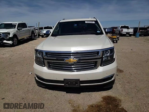 2015 Chevrolet Suburban LTZ with VIN 1GNSKKKC1FR659707, listed as a Copart auction lot 50202895 with 91,680 mi miles and Salvage Title. Bid and sale history available at DreamBid. Image 11.