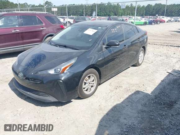 2021 Toyota Prius L Eco with VIN JTDKAMFU6M3141392, listed as a IAAI auction lot 42317866 with 137,495 mi miles and . Bid and sale history available at DreamBid. Image 16.