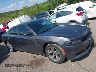 2018 Dodge Charger SXT Plus with VIN 2C3CDXHG9JH176400, listed as a IAAI auction lot 42128281 with 198,766 mi miles and . Bid and sale history available at carsss.com. Image 13.
