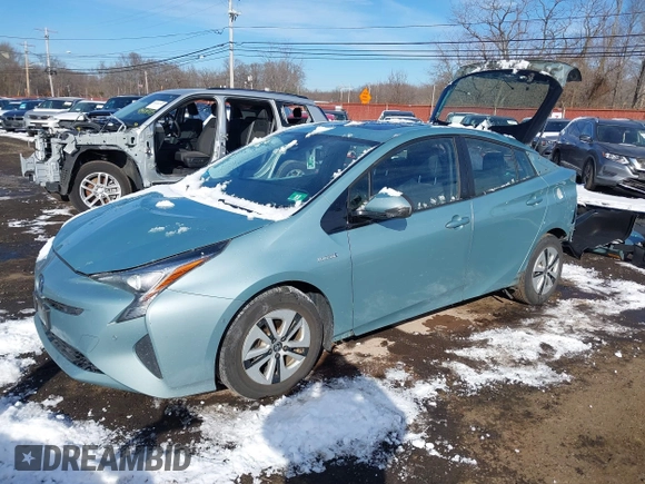 2018 Toyota Prius Two with VIN JTDKARFU5J3066998, listed as a IAAI auction lot 41405382 with 92,377 mi miles. Bid and sale history available at carsss.com. Image 2.