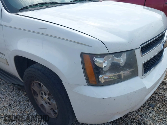 2011 Chevrolet Tahoe LT z VIN 1GNSCBE0XBR135285, wystawiony jako IAAI lot #42317804 z przebiegiem 301 967 mil mil oraz . Historia ofert i sprzedaży dostępna na DreamBid. Obrazek 6.