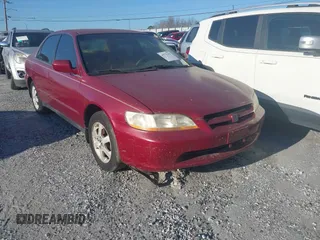 2000 Honda Accord SE z VIN JHMCG5677YC021673, wystawiony jako IAAI lot #41527432 z przebiegiem 218 930 mil mil oraz . Historia ofert i sprzedaży dostępna na DreamBid. Obrazek 1.