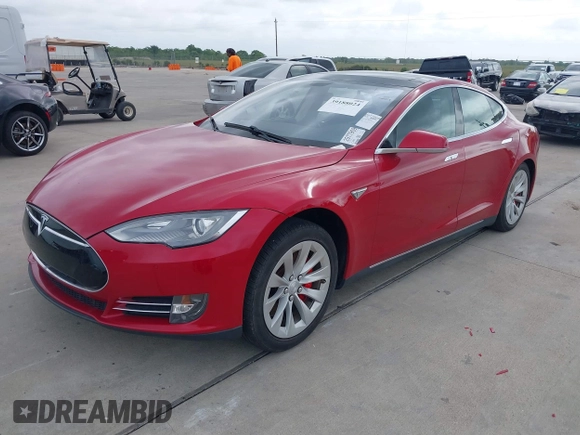 2014 Tesla Model S 60 with VIN 5YJSA1H17EFP30148, listed as a IAAI auction lot 39188024 with Not Provided miles and . Bid and sale history available at DreamBid. Image 2.