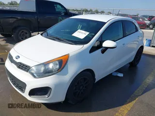 2015 Kia Rio LX with VIN KNADM5A39F6500074, listed as a IAAI auction lot 41871224 with 126,209 mi miles. Bid and sale history available at carsss.com. Image 2.
