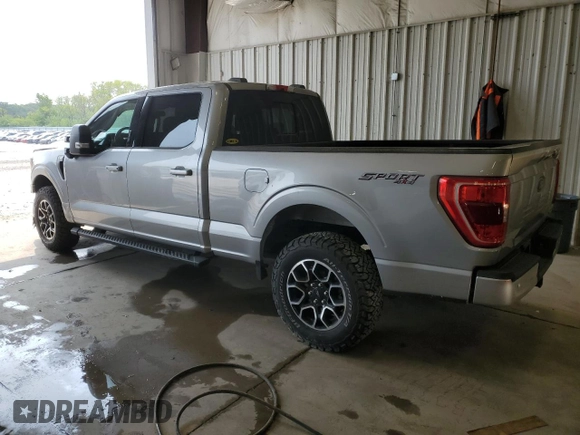 2021 Ford F-150 XL with VIN 1FTFW1E85MKE03933, listed as a Copart auction lot 60513185 with 82,793 mi miles and Salvage title. Bid and sale history available at DreamBid. Image 2.