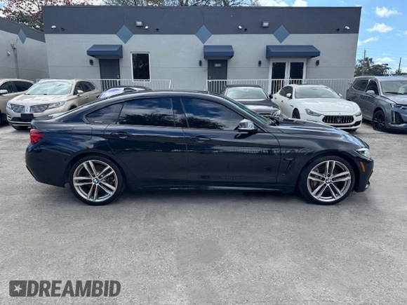 2020 BMW 4 Series 430i with VIN WBA4J1C04LBU67797, listed as a Copart auction lot 44953505 with 48,124 mi miles and Salvage title. Bid and sale history available at DreamBid. Image 13.