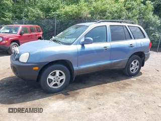 2002 Hyundai Santa Fe GLS with VIN KM8SC73D22U148410, listed as a IAAI auction lot 42159042 with 141,232 mi miles. Bid and sale history available at carsss.com. Image 2.