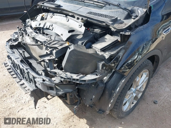 2016 Ford Escape Titanium with VIN 1FMCU9JX4GUB38303, listed as a IAAI auction lot 41788421 with 138,511 mi miles and . Bid and sale history available at DreamBid. Image 21.