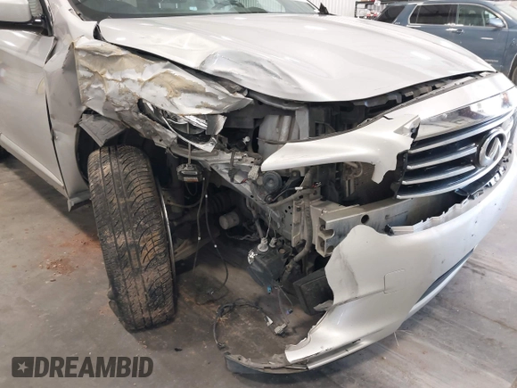 2013 Infiniti JX35 with VIN 5N1AL0MM1DC331291, listed as a IAAI auction lot 42218682 with 218,366 mi miles and . Bid and sale history available at DreamBid. Image 6.