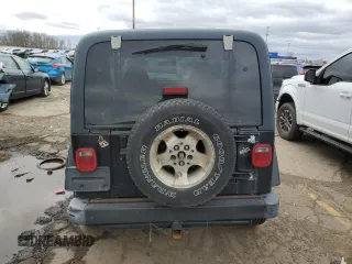 2002 Jeep Wrangler Sahara with VIN 1J4FA59S42P776905, listed as a Copart auction lot 53373015 with 231,915 mi miles and Clean Title. Bid and sale history available at carsss.com. Image 6.