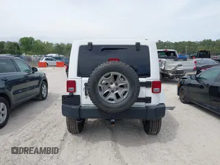 2015 Jeep Wrangler Unlimited Rubicon Hard Rock с VIN 1C4HJWFG7FL684057, выставлен на аукционе IAAI как лот 41963885 с пробегом 103 240 миль миль и . История ставок и продаж доступна на DreamBid. Изображение 16.