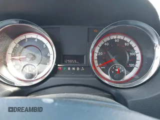 2015 Dodge Grand Caravan American Value with VIN 2C4RDGBG3FR647957, listed as a IAAI auction lot 42147813 with 129,859 mi miles and . Bid and sale history available at DreamBid. Image 7.