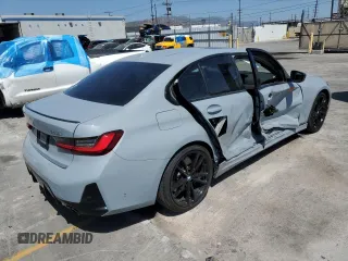 2023 BMW 3 Series 330i with VIN 3MW69FF00P8D52700, listed as a Copart auction lot 61629485 with 12,007 mi miles and Salvage title. Bid and sale history available at DreamBid. Image 3.
