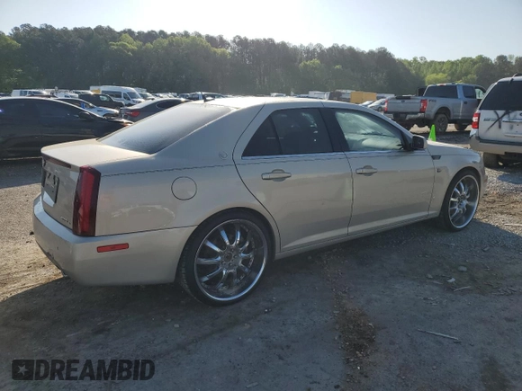 2007 Cadillac STS z VIN 1G6DW677970151227, wystawiony jako Copart lot #52345265 z przebiegiem 154 790 mil mil oraz Szkoda całkowita • Salvage title. Historia ofert i sprzedaży dostępna na DreamBid. Obrazek 3.