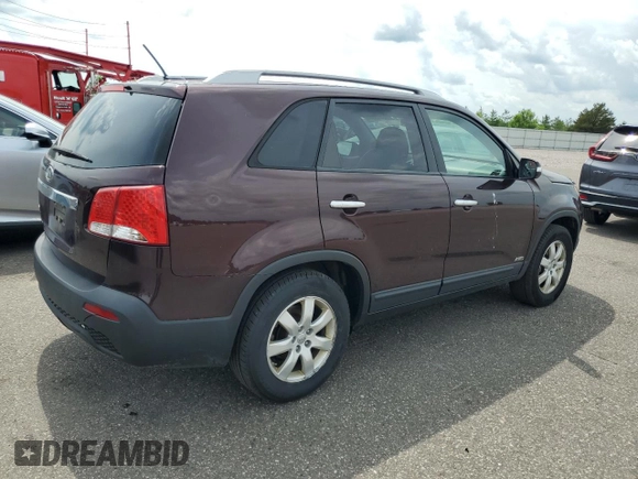2013 Kia Sorento LX with VIN 5XYKTDA23DG389370, listed as a Copart auction lot 60645535 with 176,393 mi miles and Salvage title. Bid and sale history available at DreamBid. Image 3.