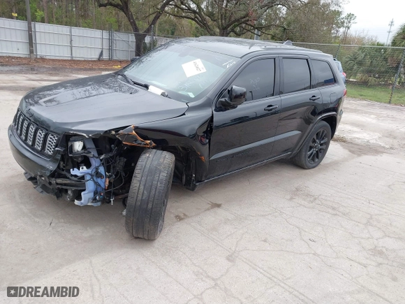 2018 Jeep Grand Cherokee Laredo E with VIN 1C4RJFAG7JC312948, listed as a IAAI auction lot 41624027 with 116,763 mi miles. Bid and sale history available at carsss.com. Image 18.