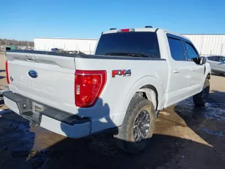 2023 Ford F-150 XL with VIN 1FTFW1E52PFB92984, listed as a IAAI auction lot 41619612 with 41,281 mi miles and . Bid and sale history available at carsss.com. Image 4.