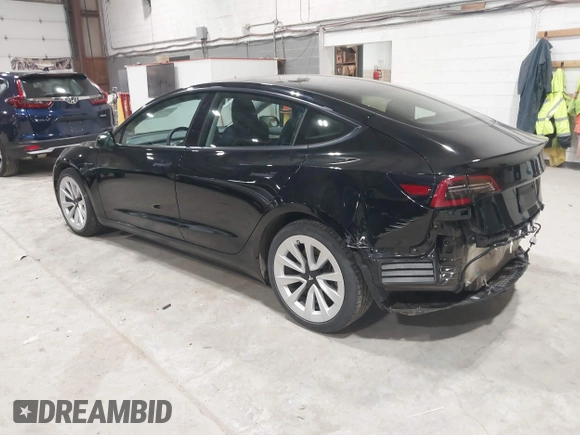 2023 Tesla Model 3 with VIN 5YJ3E1EA5PF552241, listed as a IAAI auction lot 41876487 with 18,533 mi miles and . Bid and sale history available at carsss.com. Image 3.