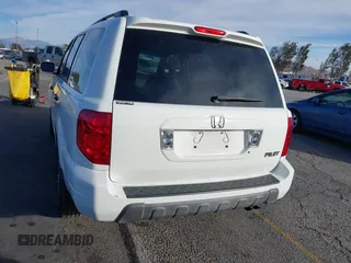2005 Honda Pilot EX with VIN 5FNYF18475B060655, listed as a IAAI auction lot 41381619 with 142,680 mi miles and . Bid and sale history available at DreamBid. Image 16.