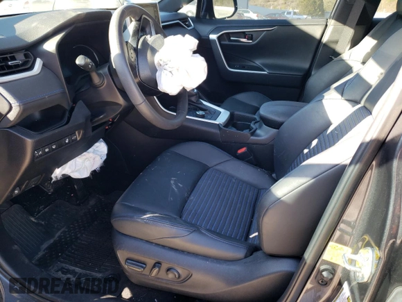 2021 Toyota RAV4 Hybrid XSE with VIN 2T3E6RFV8MW027802, listed as a Copart auction lot 49226415 with Not provided miles and Salvage title. Bid and sale history available at DreamBid. Image 7.