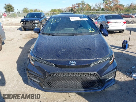 2021 Toyota Corolla SE with VIN 5YFS4MCE3MP063746, listed as a IAAI auction lot 41472956 with 72,199 mi miles. Bid and sale history available at carsss.com. Image 12.
