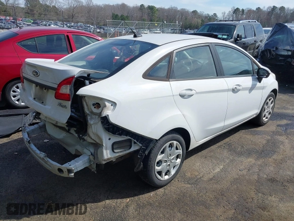 2013 Ford Fiesta S z VIN 3FADP4AJ9DM191664, wystawiony jako IAAI lot #41827196 z przebiegiem 111 982 mil mil oraz . Historia ofert i sprzedaży dostępna na DreamBid. Obrazek 4.