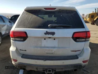 2021 Jeep Grand Cherokee Trailhawk with VIN 1C4RJFLG3MC646573, listed as a Copart auction lot 82687014 with 83,294 mi miles and Salvage Title. Bid and sale history available at carsss.com. Image 6.